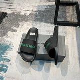 Balenciaga Black Flat Thong Sandals - Lifestyle Styling Shot