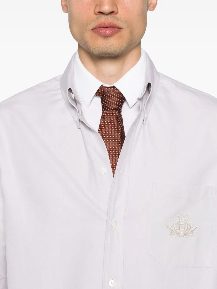 Close-up of Fendi blouses hardware and fine stitching