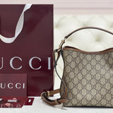 Gucci Emblem Mini Bucket Bag detail shot – designer craftsmanship and quality
