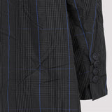 Close-up of Balenciaga coats hardware and fine stitching