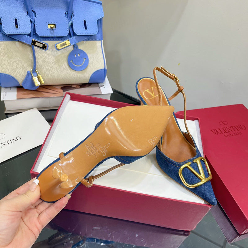 Three-quarter angle view of Valentino Garavani luxury piece style No.240