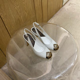 Louis Vuitton Beige Platform Heels - Sole Detail View