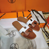 Hermès Red Gladiator Sandals - Lifestyle Styling Shot