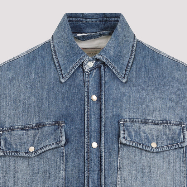 Close-up of Alexander McQueen blouses hardware and fine stitching