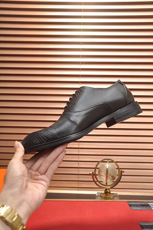 Hermes shoes Style 052 - close-up of statement logo accent