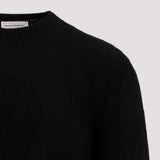 Close-up of Alexander McQueen sweaters & pullovers hardware and fine stitching