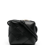 Close-up of Bottega Veneta shoulder bags hardware and fine stitching