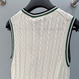 Christian Dior Knitted Vest – luxury designer knitted piece at Velouxe