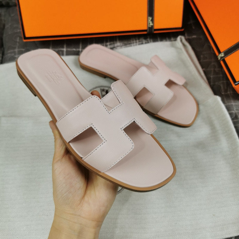 Hermès Chocolate Brown Flat Thong Sandals - Sole Detail View