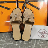 Hermes sandals Style 145 - close-up of iconic logo design