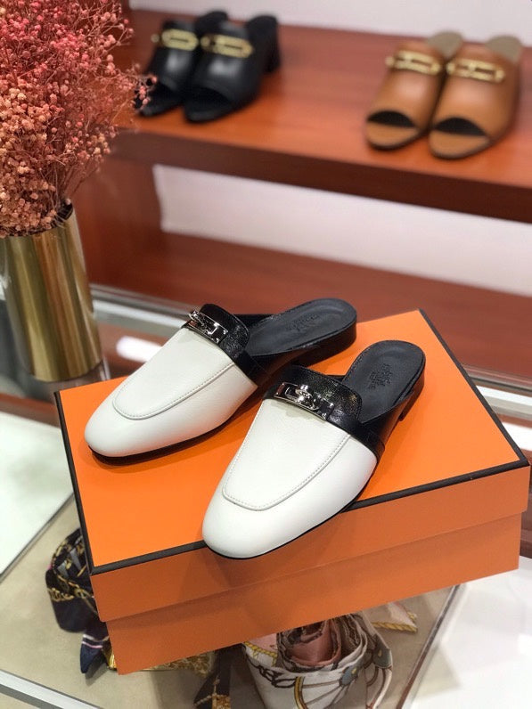 Hermès White Chunky Platform Sneakers - Angled View