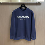 Side profile view of Balmain luxury piece style No.049
