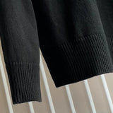 Texture and finish detail of Givenchy luxury piece style No.202