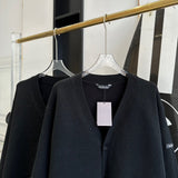 Balenciaga Cardigan – luxury designer piece at Velouxe