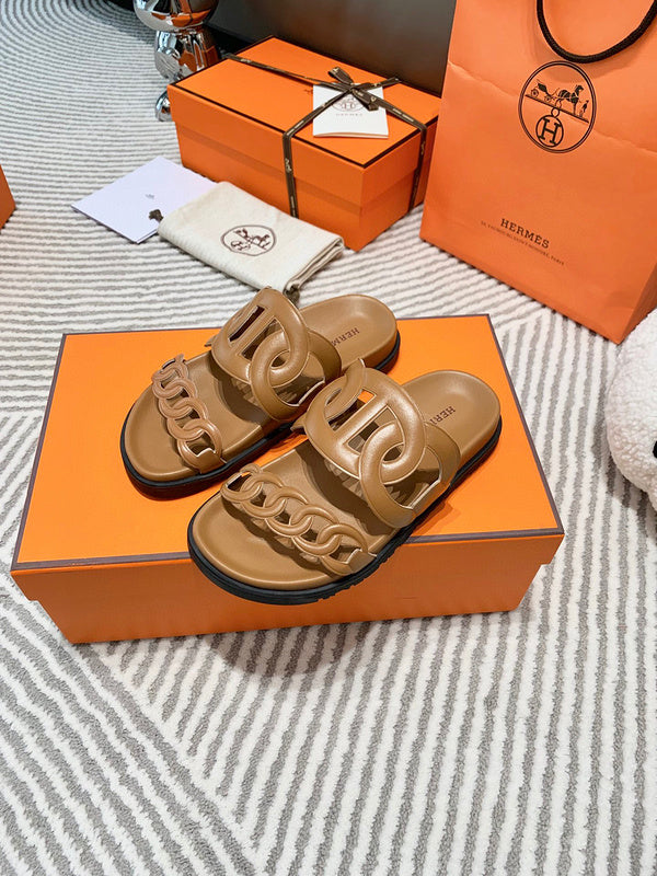 Hermès Grey Ankle Strap Sandals - Angled View