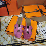 Hermes sandals Style 112 - close-up of statement logo accent