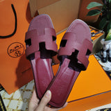 Hermès Grey Slide Sandals - Detail Shot of Craftsmanship