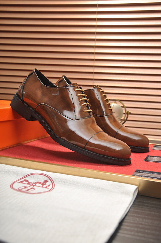 Hermes shoes Style 055 - front view, classic monogram styling