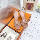 Hermès Beige Crisscross Strap Sandals - Angled View