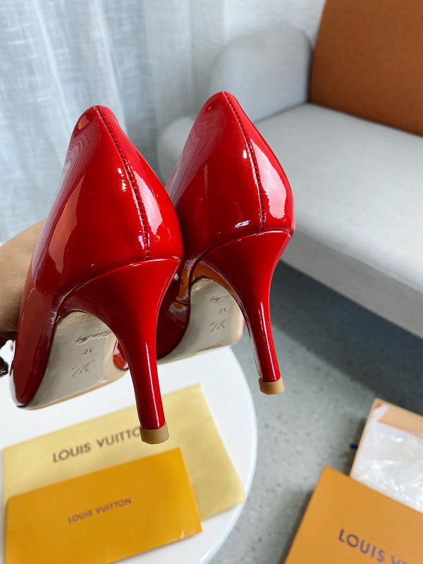 Louis Vuitton Beige Block Heel Pumps - Angled View