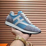 Hermès Beige Chunky Platform Sneakers - Heel Detail View