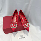 Front view of Valentino Garavani luxury piece style No.216
