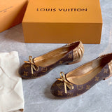 Close-up detail view of Louis Vuitton luxury piece style No.053