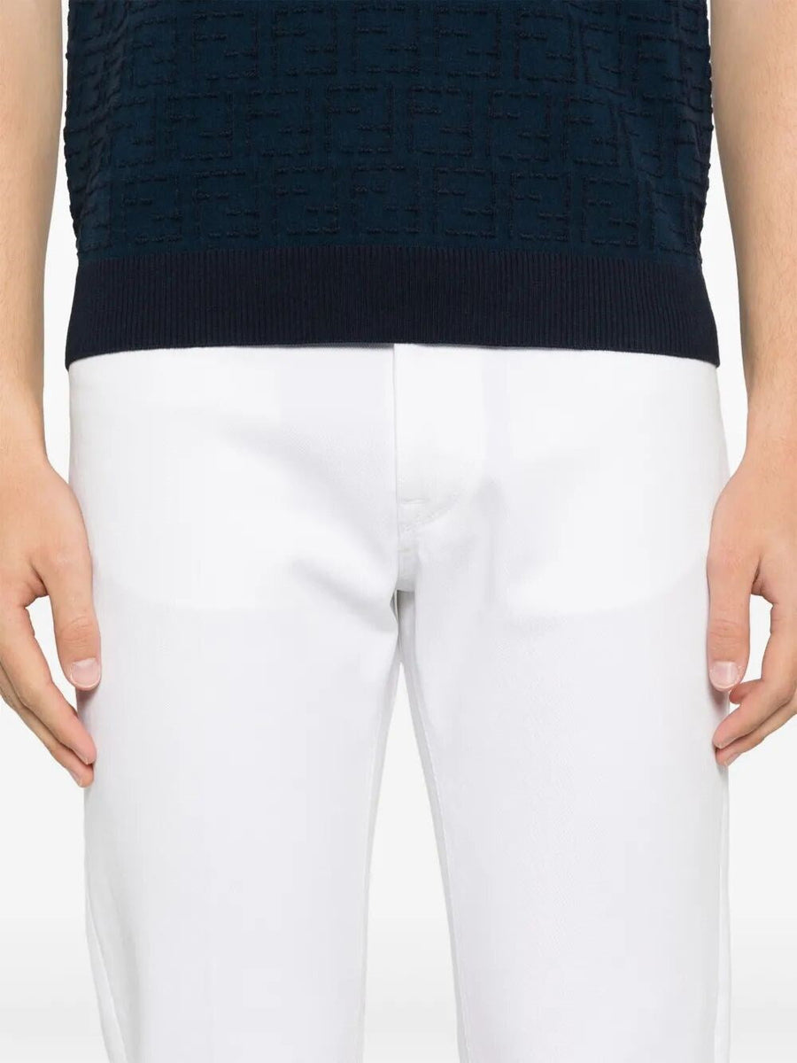 Close-up of Fendi pants hardware and fine stitching