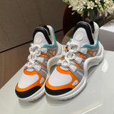Louis Vuitton White Slip-On Sneakers - Angled View