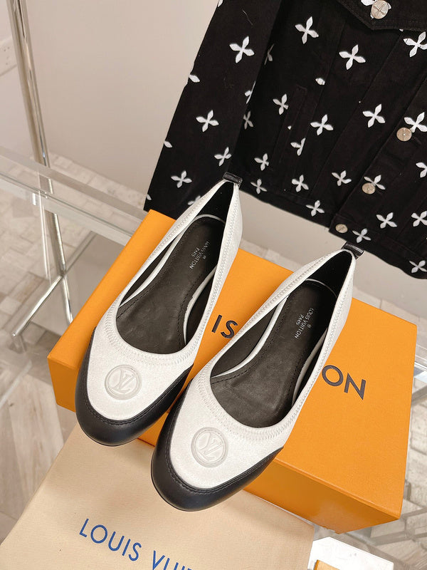 Louis Vuitton Tan High-Top Sneakers - Angled View