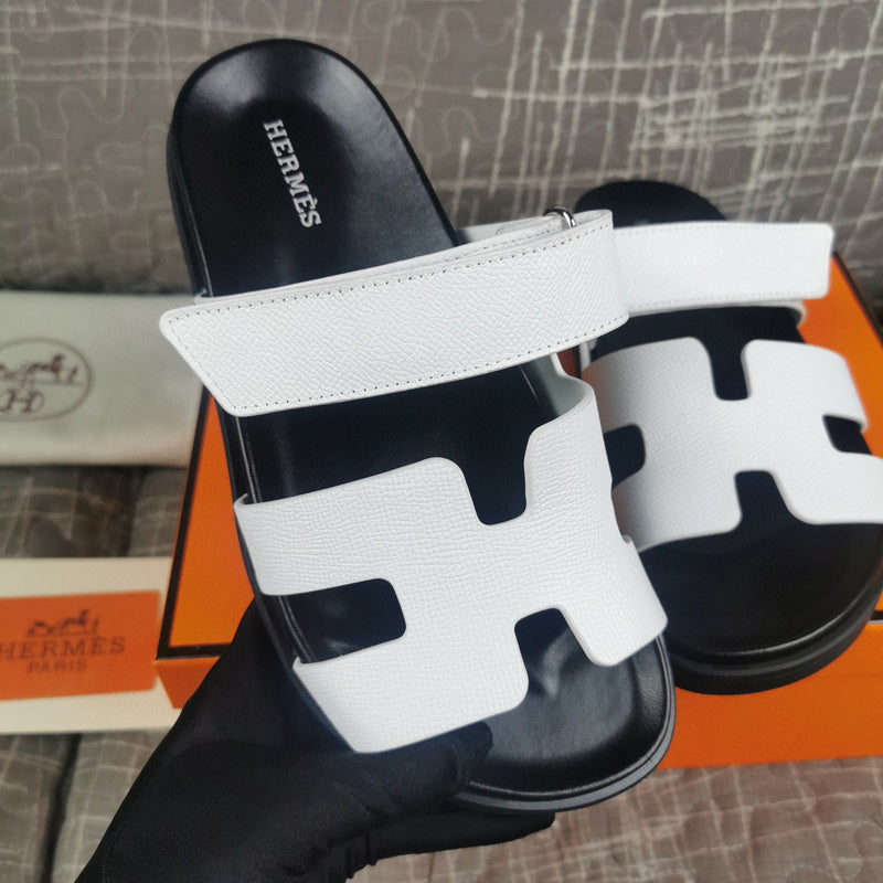 Hermès Black Slide Sandals - Angled View