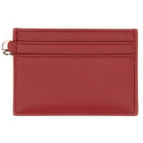 Close-up of Alexander McQueen wallets hardware and fine stitching