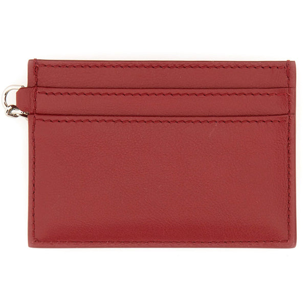 Close-up of Alexander McQueen wallets hardware and fine stitching
