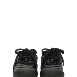 Close-up of Alexander McQueen athletic hardware and fine stitching