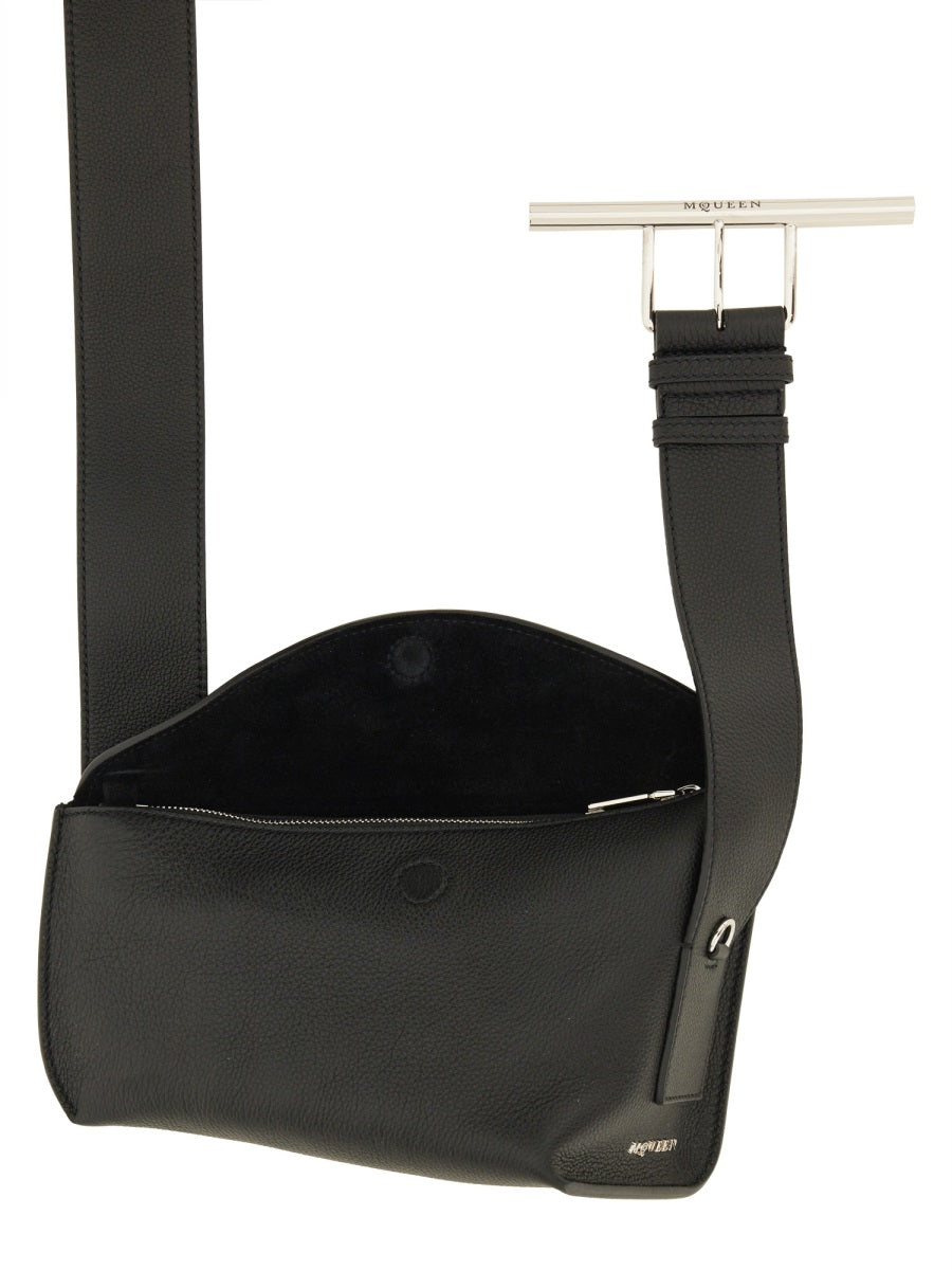 Close-up of Alexander McQueen cross body bags hardware and fine stitching