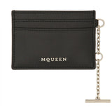 Close-up of Alexander McQueen wallets hardware and fine stitching