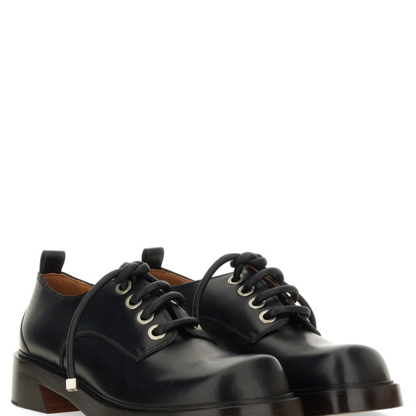 Alexander McQueen premium athletic detail and craftsmanship close-up