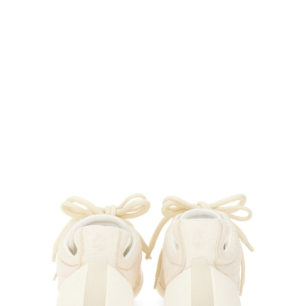 Alexander McQueen athletic side profile designer luxury fashion