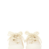 Close-up of Alexander McQueen athletic hardware and fine stitching