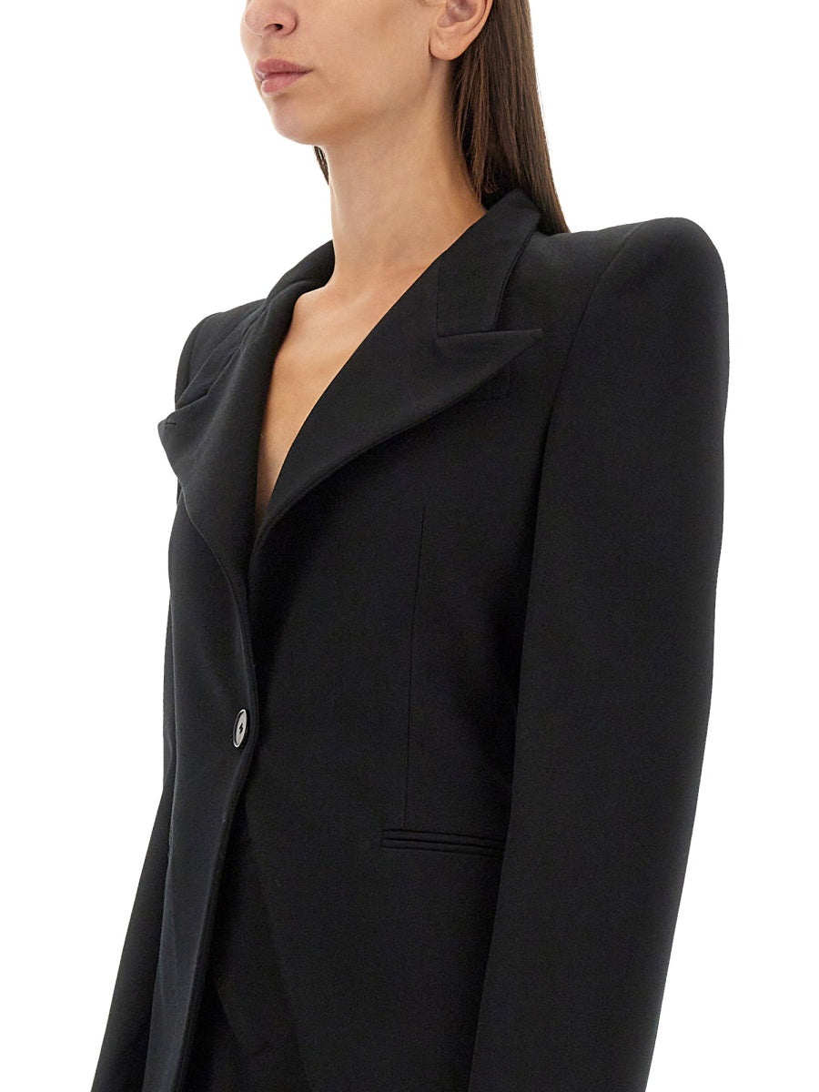 Close-up of Alexander McQueen jackets hardware and fine stitching