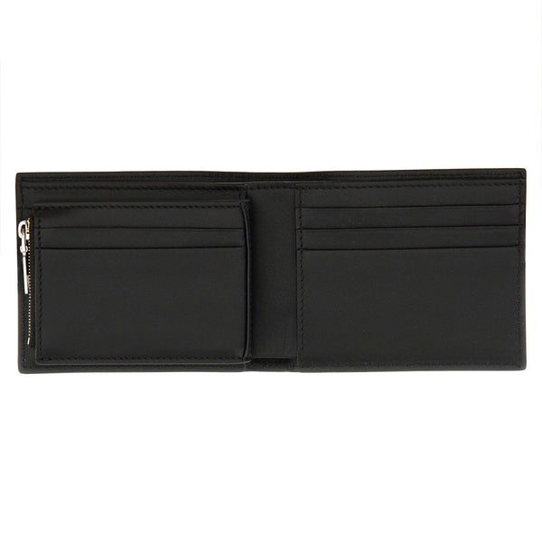 Close-up of Alexander McQueen wallets hardware and fine stitching
