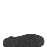Close-up of Alexander McQueen athletic hardware and fine stitching