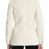 Close-up of Alexander McQueen coats hardware and fine stitching