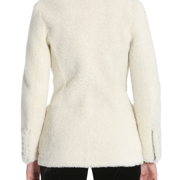 Close-up of Alexander McQueen coats hardware and fine stitching