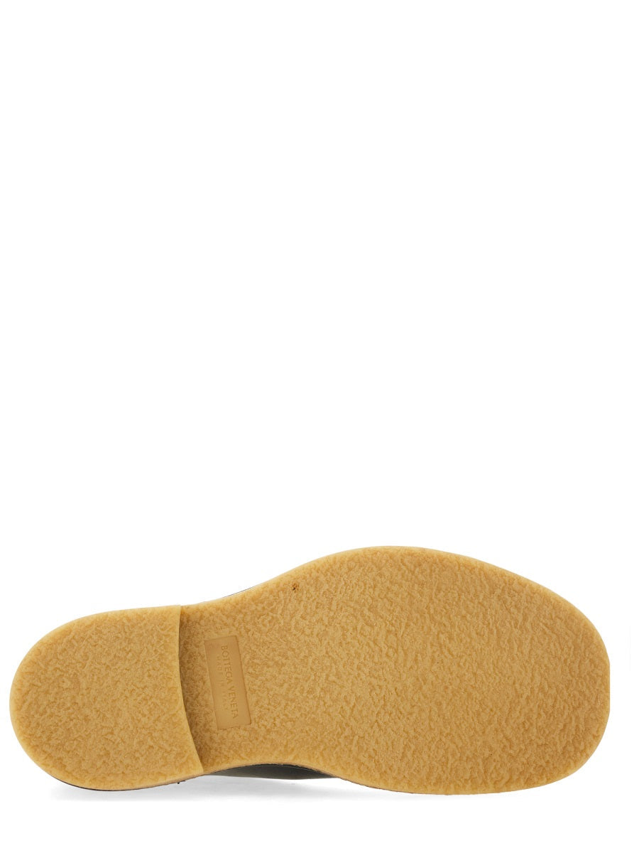 Close-up of Bottega Veneta boots & booties hardware and fine stitching