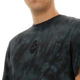 Close-up of Alexander McQueen tee shirts hardware and fine stitching