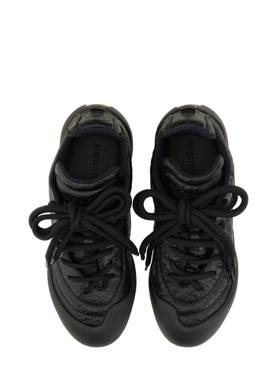 Alexander McQueen premium athletic detail and craftsmanship close-up