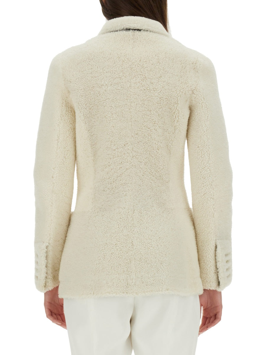 Alexander McQueen premium coats detail and craftsmanship close-up