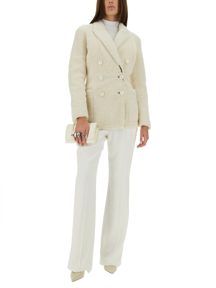 Alexander McQueen premium coats detail and craftsmanship close-up