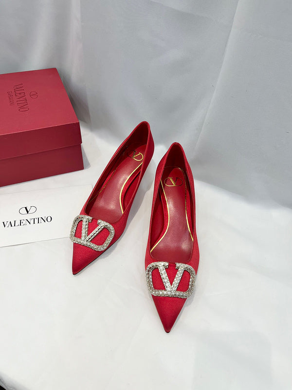 Side profile view of Valentino Garavani luxury piece style No.216